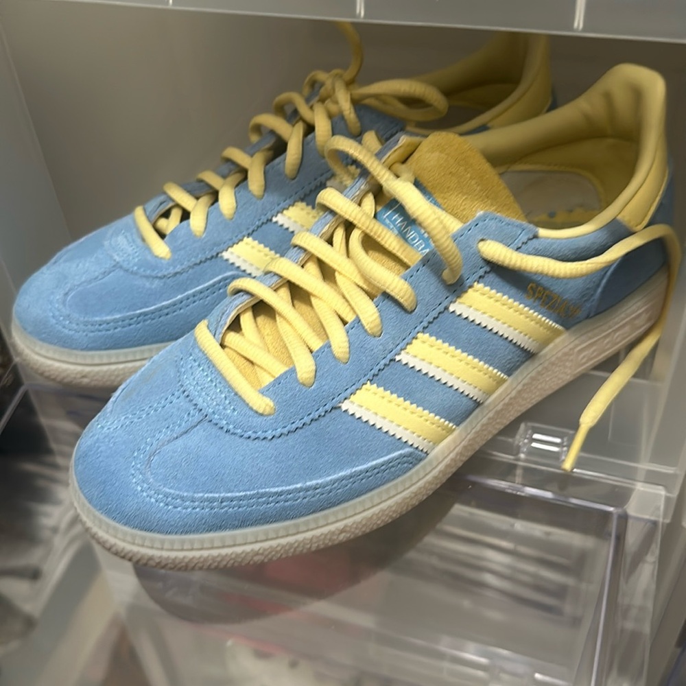 Adidas Spezials baby blue and yellow. Fits my size 7 woman’s foot